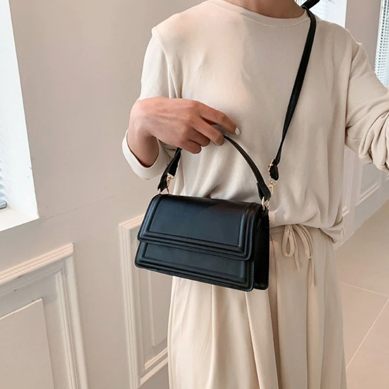 Elegancka torebka z klapką – Stylowa i funkcjonalna