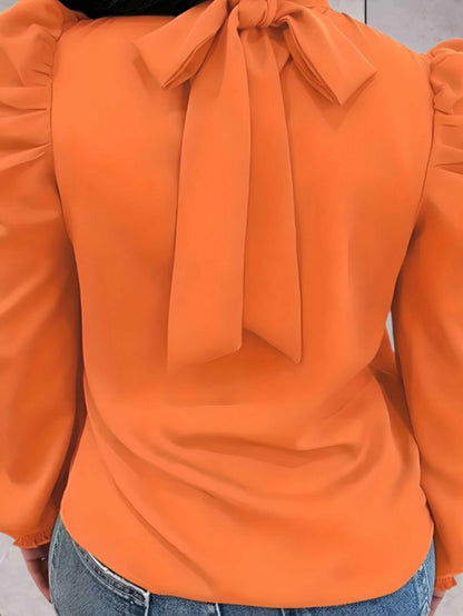 Elegancka bluzka z bufkami – Styl i kobiecość w jednym